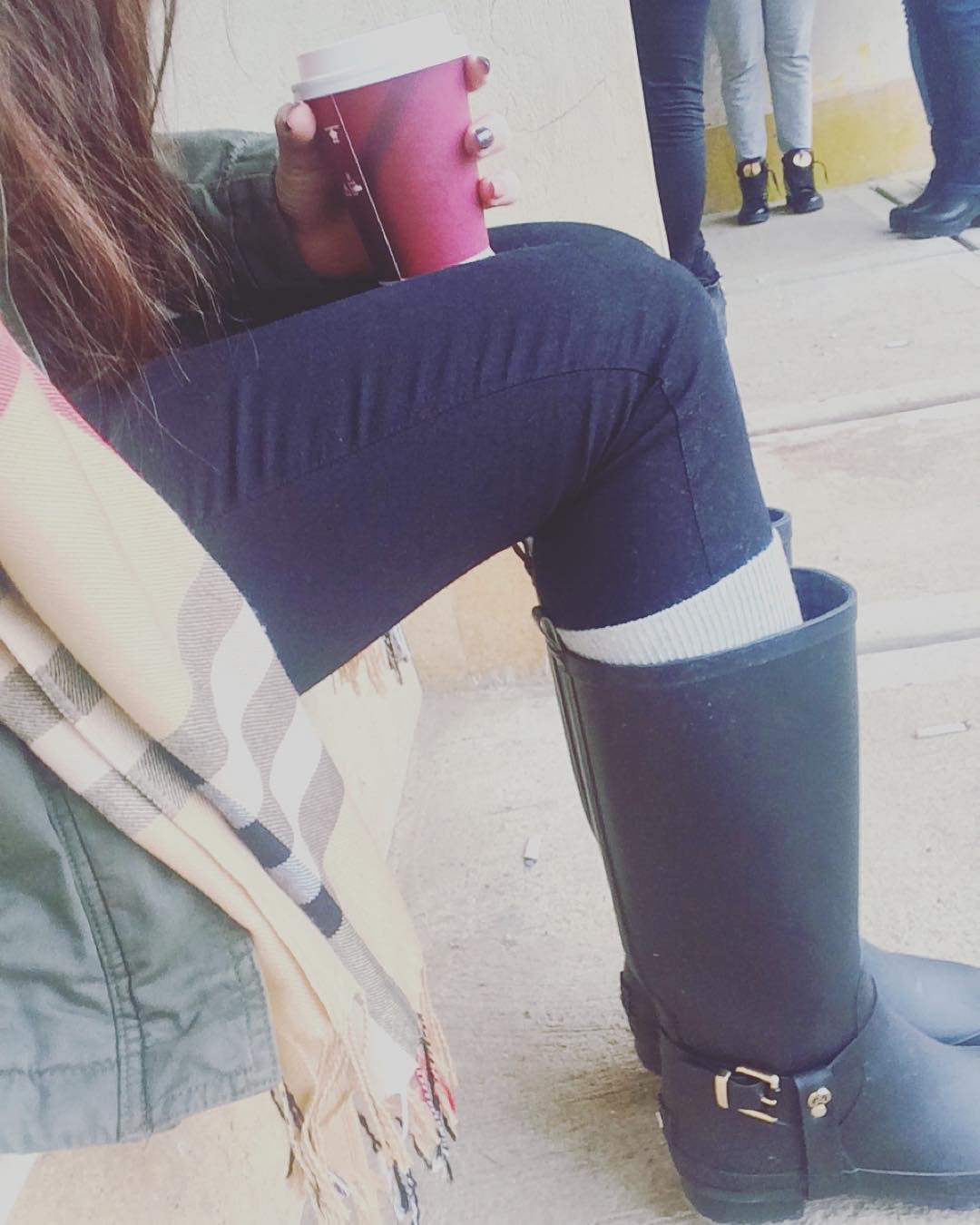 women wearing leggings and Rain boots