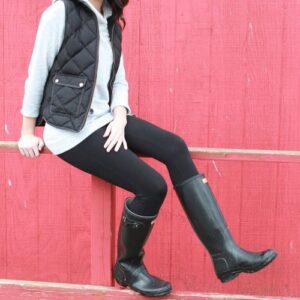 knee-high boots Paired with leggings